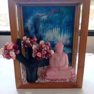 Cadre composition débordante bouddha fond bleu